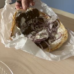 Inside the gyro, so full of meat Inside the gyro, so full of meat