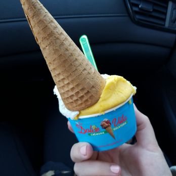La Dolce Vita - a person holding an ice cream cone - Ice Cream & Frozen Yogurt Near Me - Kirkland, Quebec La Dolce Vita - a person holding an ice cream cone - Ice Cream & Frozen Yogurt Near Me - Kirkland, Quebec