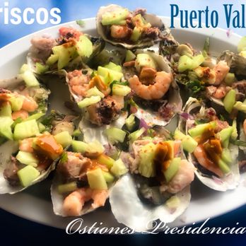 Mariscos Puerto Vallarta - a plate of clams with shrimp and cucumbers - Seafood Near Me - Pacoima, California Mariscos Puerto Vallarta - a plate of clams with shrimp and cucumbers - Seafood Near Me - Pacoima, California