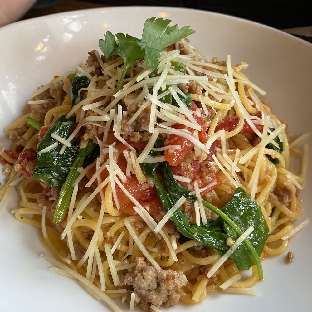 Carmella's - Special: Pasta with sweet sausage, spinach, tomatoes in garlic olive oil. Wow! - Italian Near Me - Appleton, Wisconsin