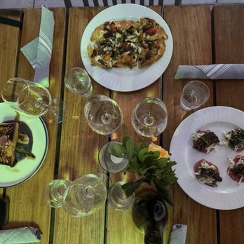 Benchmark at Maison Fox - Left to right: Salmon over Okinawan potatoes, Chorizo flatbread, Korean beef tacos - New American Near Me - Fullerton, California