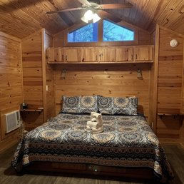 King size bed in cozy cabin King size bed in cozy cabin