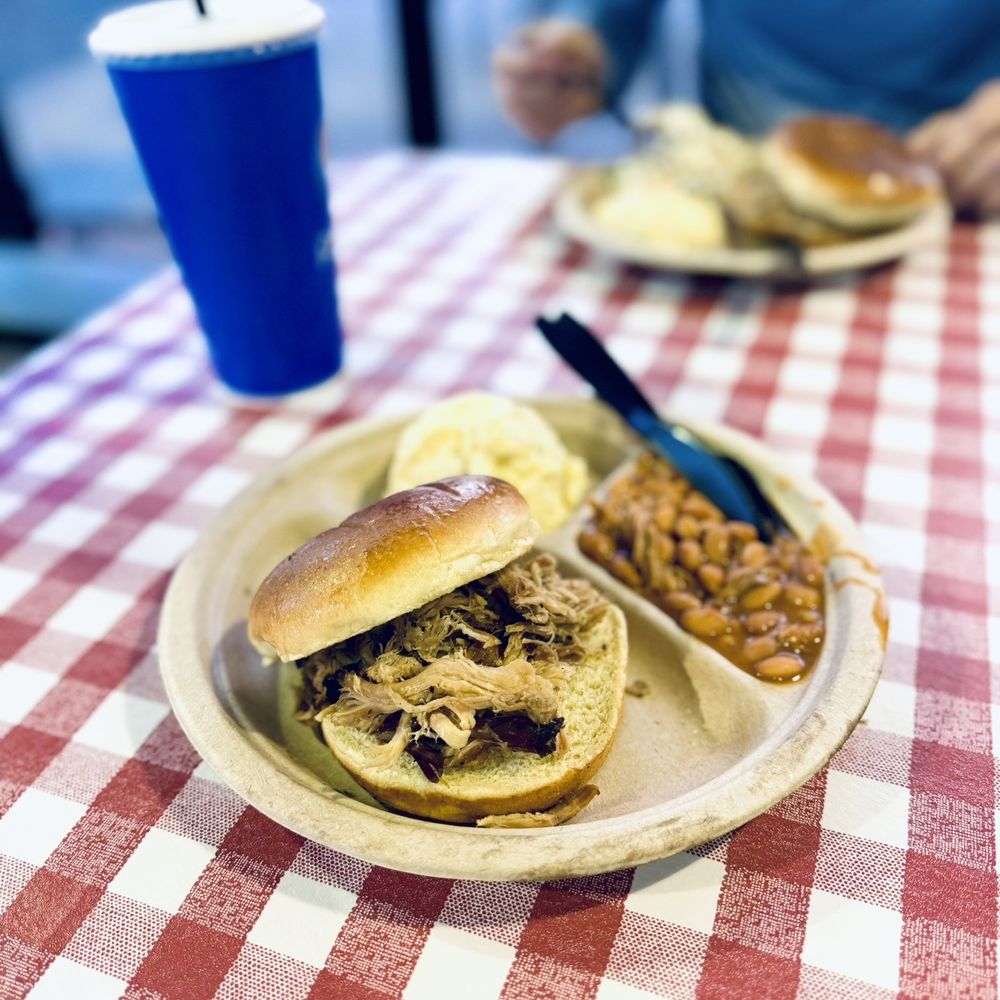 Big John's Texas BBQ - Pulled pork sandwich; baked beans; potato salad - Barbeque Near Me - Page, Arizona Big John's Texas BBQ - Pulled pork sandwich; baked beans; potato salad - Barbeque Near Me - Page, Arizona