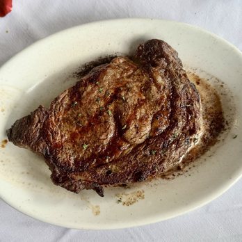 Ruth's Chris Steakhouse - 16oz Ribeye, medium - Steakhouses Near Me - Asheville, North Carolina Ruth's Chris Steakhouse - 16oz Ribeye, medium - Steakhouses Near Me - Asheville, North Carolina