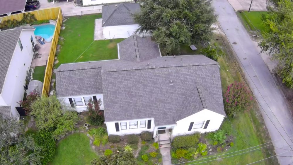 Slide of Contender Roofing and Construction