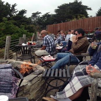 Moss Beach Distillery - Chilling on the patio with warm throws and fire pit! So romantic! - Seafood Near Me - Moss Beach, California