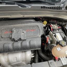 Mechanic forgot to put my batter cover back on after testing it. Mechanic forgot to put my batter cover back on after testing it.