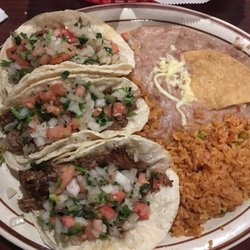 Lallos Bar & Grill - 3 Taco Plate. Carnitas on corn tortillas of course!