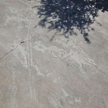 TBG Construction - cement stains on our driveway - General Contractors Near Me - Anaheim, California TBG Construction - cement stains on our driveway - General Contractors Near Me - Anaheim, California