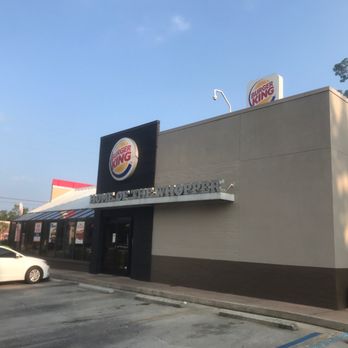 Burger King - a white car parked in front of the restaurant - Burgers Near Me - Covington, Louisiana