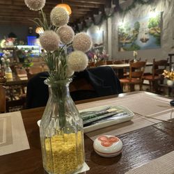 Hoang Minh - Atmosphere, we received a buzzer from our server to click when we were ready to order and pay.