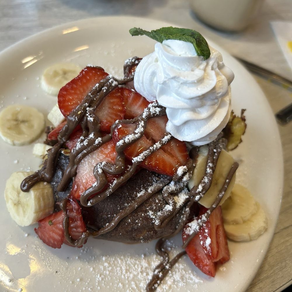 Loaded Cafe - Long Beach - Nutella Concha with strawberries and banana - American Near Me - Long Beach, California Loaded Cafe - Long Beach - Nutella Concha with strawberries and banana - American Near Me - Long Beach, California