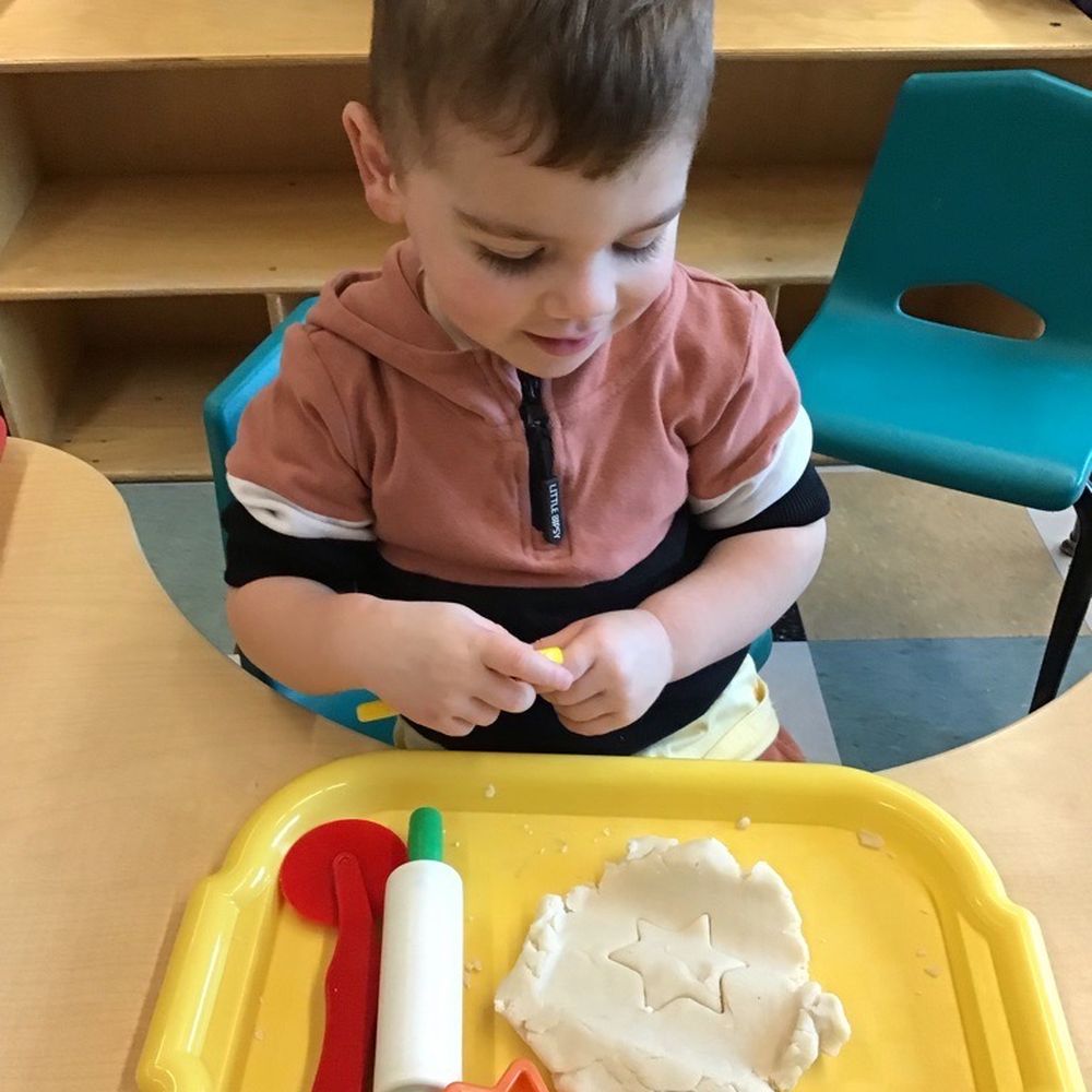 Sammamish Children's School - Playdoh practicing rolling, cutting, and 'cookie' making - Preschools Near Me - Sammamish, Washington