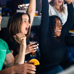 TopGolf Swing Suite - Watch a live event in one bay and play like a pro in the other.