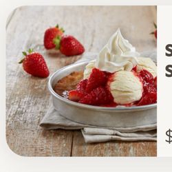 BJ's Restaurant & Brewhouse - A picture of there dessert and what I got was 5 strawberries in a cup