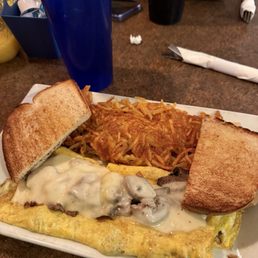 Philly Steak Omelette with no peppers, white toast, and hash browns