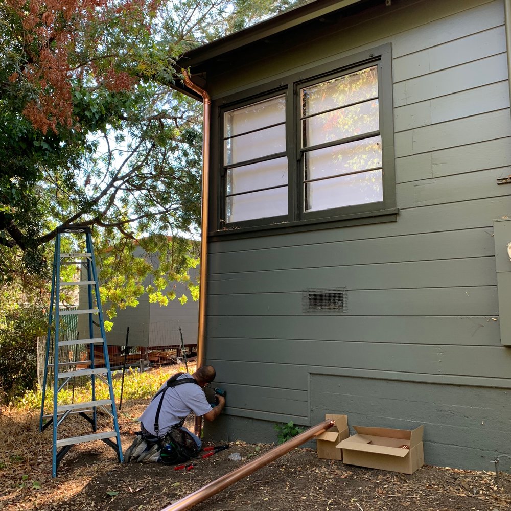 Slide of Signature Rain Gutters & Metal Works
