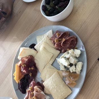 The Restorative - Charcuterie and cheese plate with olives - New American Near Me - Dunedin, Florida The Restorative - Charcuterie and cheese plate with olives - New American Near Me - Dunedin, Florida