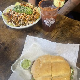 Al pastor torta , ceviche nachos, michelada