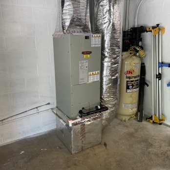Singer Heating and Cooling - The indoor air handler of a Trane heat pump system that we installed. - Heating & Air Conditioning/HVAC Near Me Singer Heating and Cooling - The indoor air handler of a Trane heat pump system that we installed. - Heating & Air Conditioning/HVAC Near Me