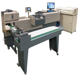 KAS Paper Systems - KAS plastic card match/attach and envelope inserting machine.