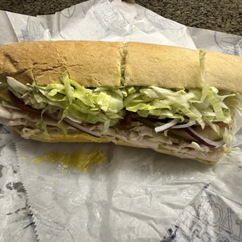Beach Hut Deli - Surfin' Bird™: Turkey, avocado, bacon & cream cheese with lots of lettuce and tomato - size is large !! - Sandwiches Near Me - Brentwood, California