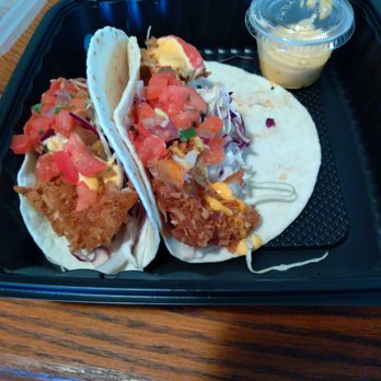 Bahama Breeze - Coconut shrimp tacos. 2 each on two. Lunch portion, I presume. - Seafood Near Me - Sanford, Florida Bahama Breeze - Coconut shrimp tacos. 2 each on two. Lunch portion, I presume. - Seafood Near Me - Sanford, Florida