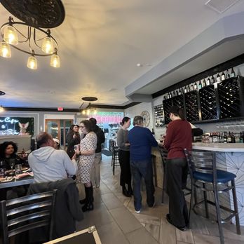 Mia Cafe and Wine Bar - Enjoying an afternoon wine break with friends, wine, and small bites. - Wine Bars Near Me - Kirkland, Washington