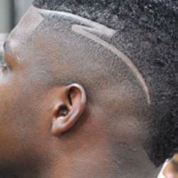 A' Style of the Fo'Hawk, Faded down to the skin & meets to a point in the back. W/ his choice of DesignROC
