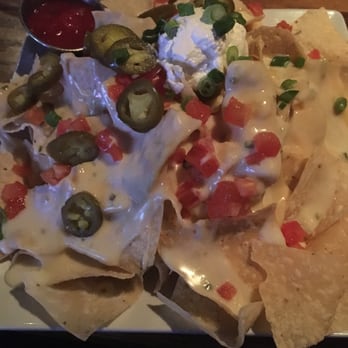 Austins Bar & Grill - Queso nachos. No meat. - American Near Me - Olathe, Kansas Austins Bar & Grill - Queso nachos. No meat. - American Near Me - Olathe, Kansas
