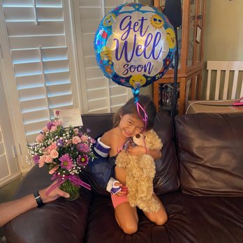 Flower Market Florist - My Niece with a Cheshire grin across her face! - Florists Near Me - Pinellas Park, Florida Flower Market Florist - My Niece with a Cheshire grin across her face! - Florists Near Me - Pinellas Park, Florida