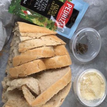 Carrabba's Italian Grill - Hot baked fresh bread, extra virgin olive oil, herbs. and Parmesan cheese. - Italian Near Me - Palm Bay, Florida Carrabba's Italian Grill - Hot baked fresh bread, extra virgin olive oil, herbs. and Parmesan cheese. - Italian Near Me - Palm Bay, Florida