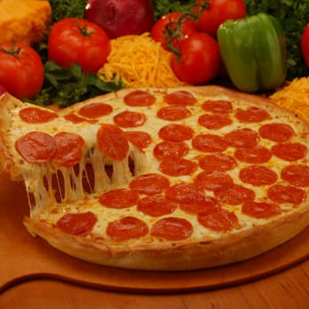 Simple Simon's Pizza - a pepperoni pizza on a cutting board - Pizza Near Me - Bixby, Oklahoma Simple Simon's Pizza - a pepperoni pizza on a cutting board - Pizza Near Me - Bixby, Oklahoma