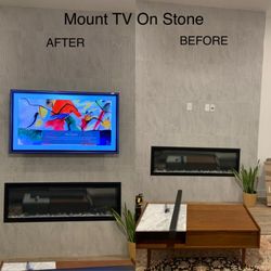 Wickman Contracting - Installation of tv wall mount above fire place tile mounted to stone.