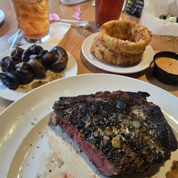 Briquettes Steakhouse - Excellent meal of KC steak bone in with onion rings and mushrooms!!! - Steakhouses Near Me - Saraland, Alabama Briquettes Steakhouse - Excellent meal of KC steak bone in with onion rings and mushrooms!!! - Steakhouses Near Me - Saraland, Alabama