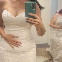 Me in the dress I ended up buying... my daughter is in the background.