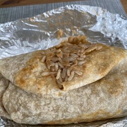Burrito with a HUGE, gaping hole, in the center. Burrito with a HUGE, gaping hole, in the center.