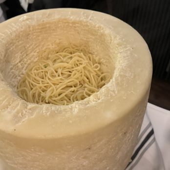 Il Tinello - Cacio e Pepe prep in the cheese wheel - Italian Near Me - New York, New York Il Tinello - Cacio e Pepe prep in the cheese wheel - Italian Near Me - New York, New York