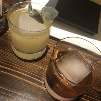 Firewood - Left: Her Remedy (gin, eucalyptus, ginger, amaro) Right: Woodland Sold Fashioned (one of the best Old Fashioned's I have ever had) - New American Near Me - Park City, Utah Firewood - Left: Her Remedy (gin, eucalyptus, ginger, amaro) Right: Woodland Sold Fashioned (one of the best Old Fashioned's I have ever had) - New American Near Me - Park City, Utah