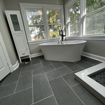 Click Construction and Remodeling - Nice soaking tub and herring bone floor design - General Contractors Near Me - Ashburn, Virginia Click Construction and Remodeling - Nice soaking tub and herring bone floor design - General Contractors Near Me - Ashburn, Virginia