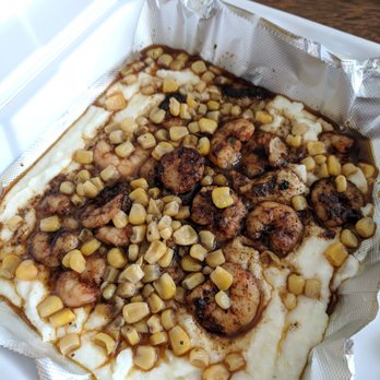 Heard Dat Kitchen - Shrimp and Grits (To go order) - Cajun/Creole Near Me - New Orleans, Louisiana Heard Dat Kitchen - Shrimp and Grits (To go order) - Cajun/Creole Near Me - New Orleans, Louisiana