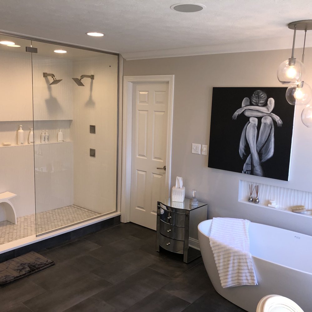 Trim It Up - a bathroom with a large bathtub - Painters Near Me - Carmel, Indiana