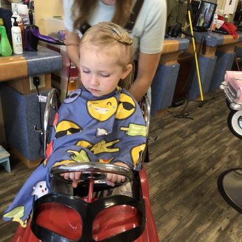 Corky's Cuts 4 Kids - Piper getting her hair done - Hair Salons Near Me - Clovis, California Corky's Cuts 4 Kids - Piper getting her hair done - Hair Salons Near Me - Clovis, California