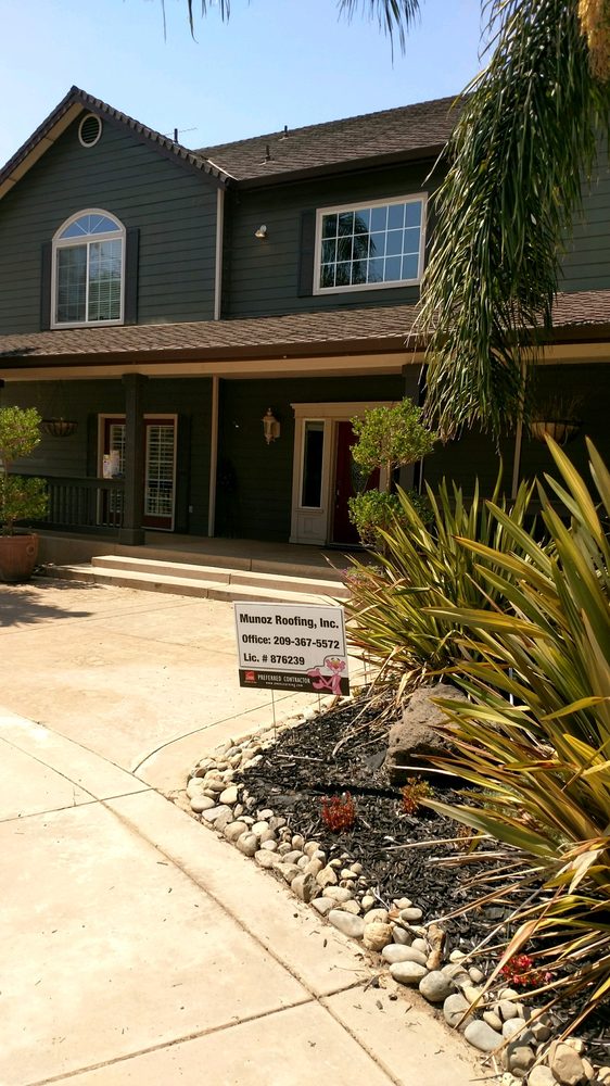 Slide of Munoz Roofing