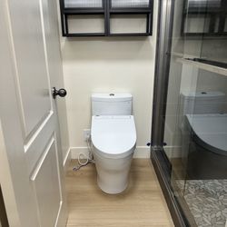 J&D Contracting - Toilet and cabinets