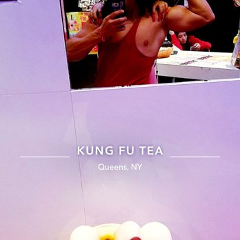 Kung Fu Tea - The cat seems enthusiastic about our pose. The girl in the bg seems bored af. - Coffee & Tea Near Me - Elmhurst, New York