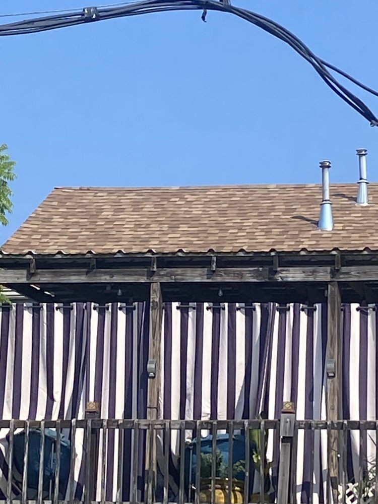 Slide of American Men Roofing