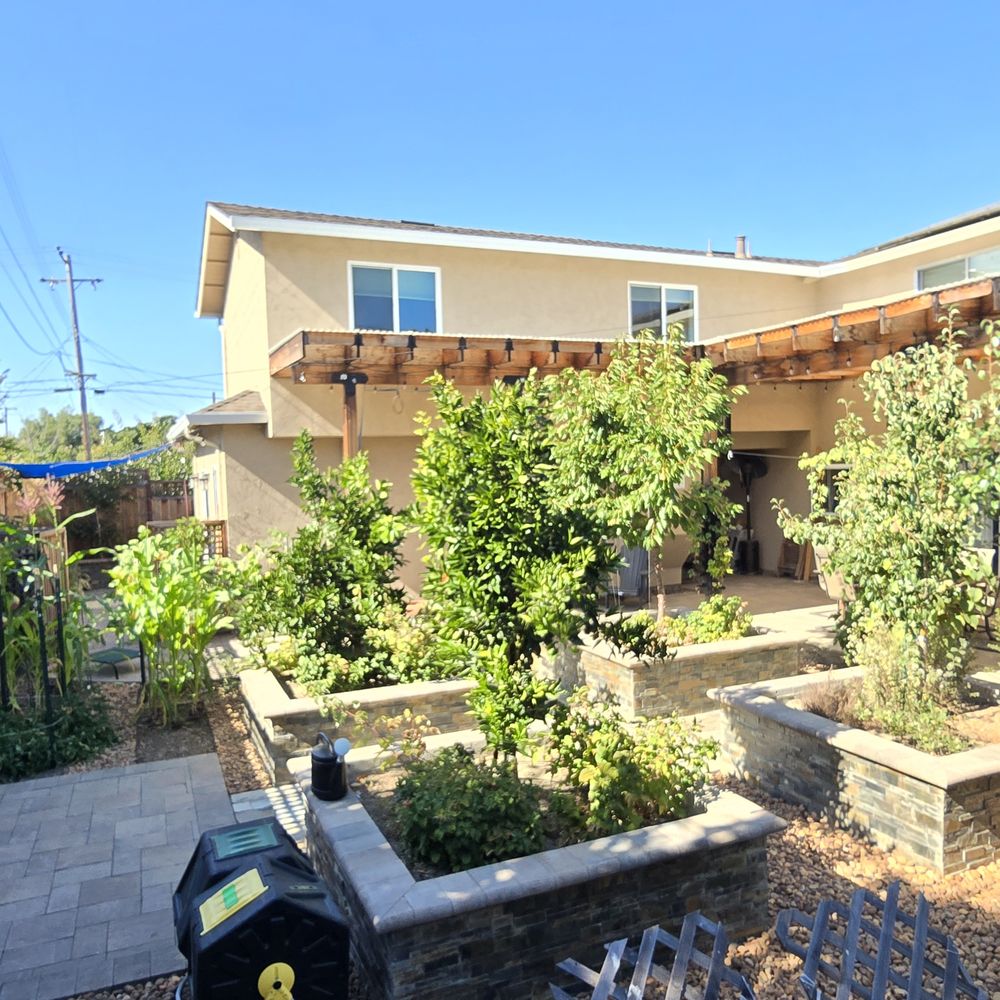 Two-story ADU with gated patio on left, breezeway on right, upper story has two bedrooms, laundry. Custom redwood patio cover and hardscape. Two-story ADU with gated patio on left, breezeway on right, upper story has two bedrooms, laundry. Custom redwood patio cover and hardscape.