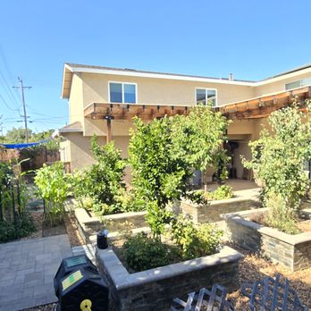Tony Tran Construction - Two-story ADU with gated patio on left, breezeway on right, upper story has two bedrooms, laundry. Custom redwood patio cover and hardscape. - General Contractors Near Me Tony Tran Construction - Two-story ADU with gated patio on left, breezeway on right, upper story has two bedrooms, laundry. Custom redwood patio cover and hardscape. - General Contractors Near Me