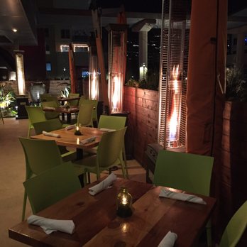 Hugo's Invitados - Outdoor seating at night - Seafood Near Me - Irving, Texas